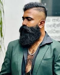 Man with a long beard and shorter hair Credit: Men Deserve
